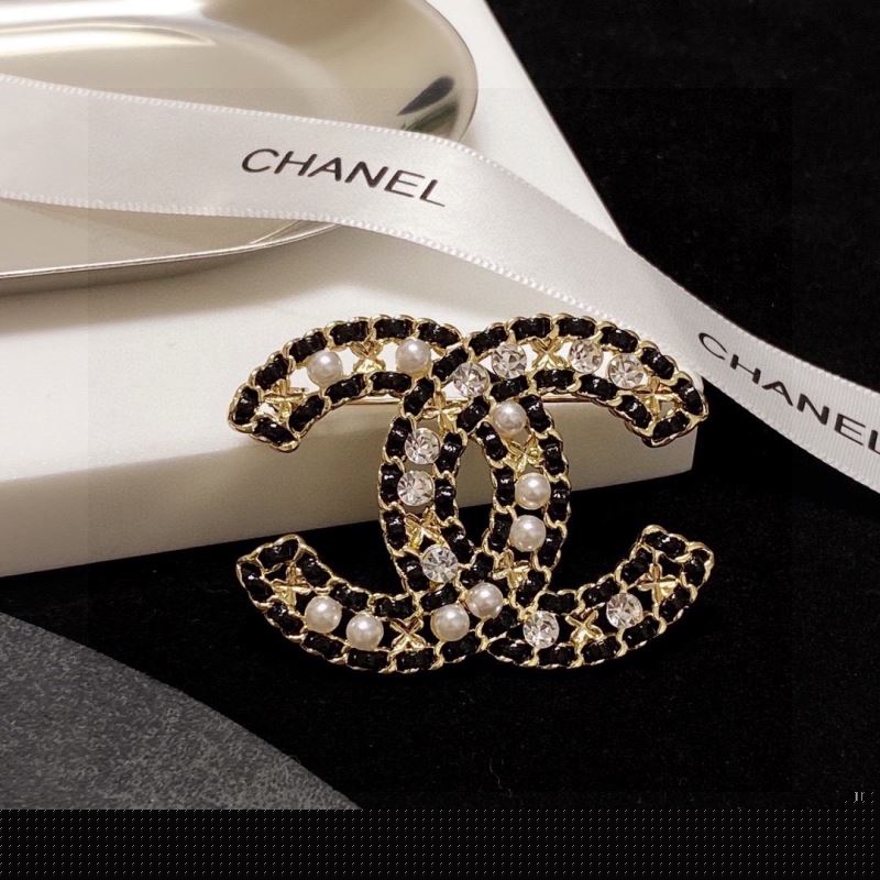 Ch*el brooches